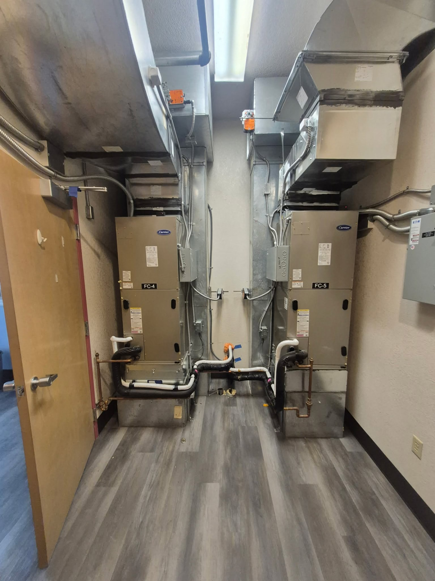 New Carrier fan-coil air handlers in the Orondo School District mechanical room